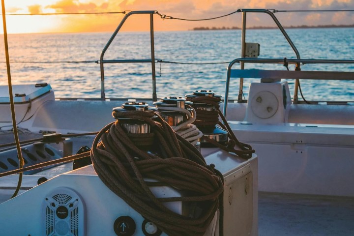 a wooden boat in a body of water